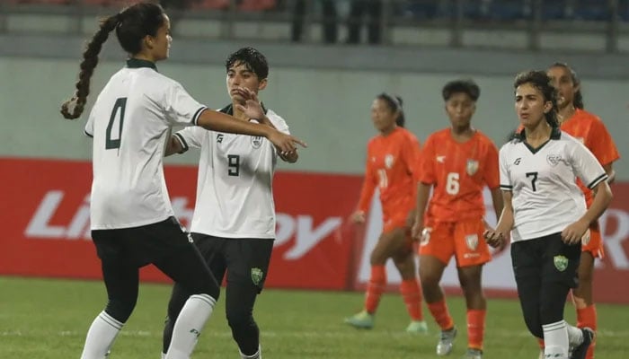 Pakistan woman players seen celebrating.— AFP/file