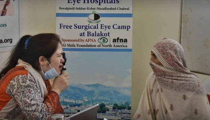 Representational image shows a female doctor examining the eyes of a patient on June 31, 2024. — Facebook/Al-Shifa Trust Eye Hospital