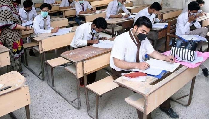 An undated photograph of students appearing for an exam. — AFP/File