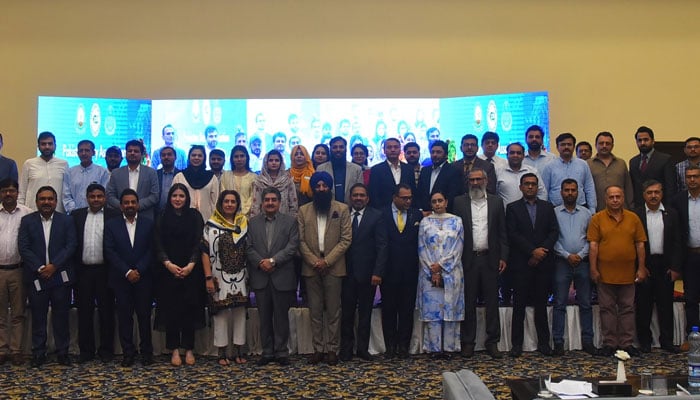 Minister for Minorities & Human Affairs Ramesh Singh Arora (centre) poses for a group photo with others at a national dialogue on World Food Day 2024 organised by PDA in collaboration with  PFA and GAIN at a local hotel on October 17, 2024. — Facebook/Pakistan Dairy Association