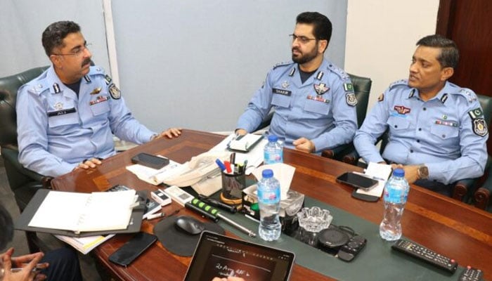 Inspector General (IG) of Police, Syed Ali Nasir Rizvi (left) seen in a meeting on Oct 18, 2024. — APP/File