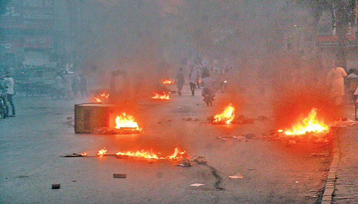 Barricades around the Saddar area have been set on fire during a gathering on Oct 18, 2024 to offer Fateha for a deceased TLP member in violation of Section 144.  — Online