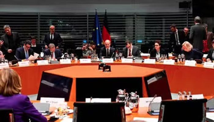 German Chancellor Olaf Scholz (center) at a conference with the PMs and ministers of the Länder at the Berlin Chancellery on November 6, 2023. — AFP