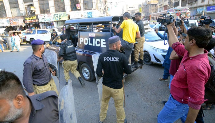 Police officials arrest to repel protesters during the (PTI) protest demonstration for the release of PTI Founder Imran Khan, at Empress Market in Karachi on October 18, 2024. — PPI