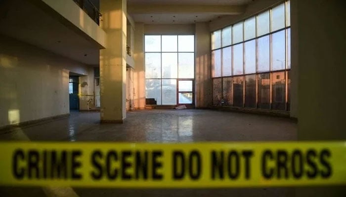 Representational image shows an area inside an office compound cordoned off by a barricade tape. — AFP/File