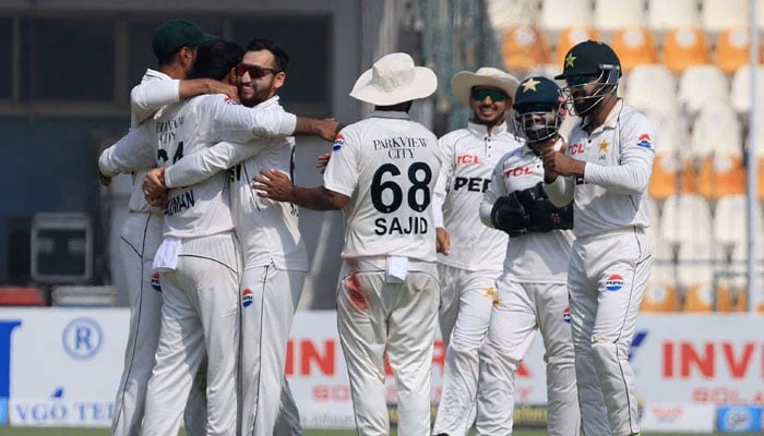 Pakistan players celebrate after winning the second Test against England at the Multan Cricket Stadium in Multan on October 18, 2024. — Reuters