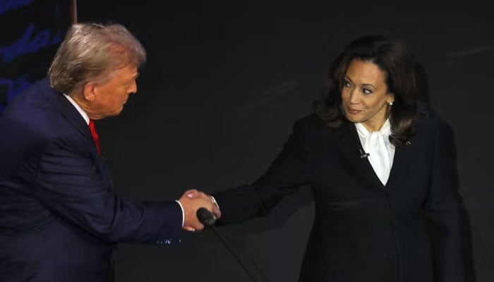 Former US president and Republican candidate Donald Trump (left) shakes hands with incumbent Vice President and Democratic candidate Kamala Harris before their first presidential debate. — Reuters/File