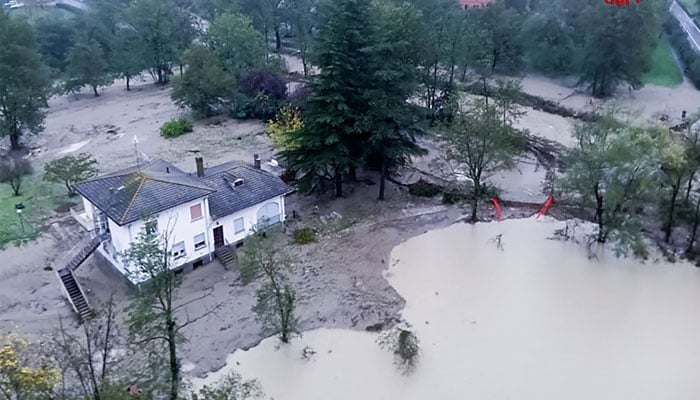 This handout photograph taken and released by the Vigili del Fuoco, the Italian Corps of Firefighters, on October 20, 2024, shows an aerial view of the flooded area near the city of Bologna. — AFP