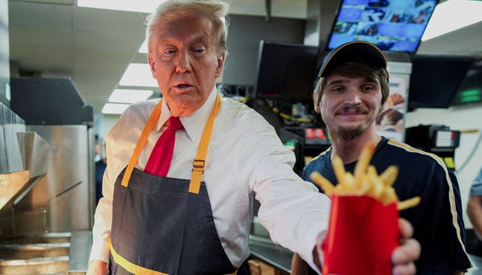 Former US president Donald Trump handing out fries at a McDonalds in Feasterville-Trevose, Pennsylvania on US October 20, 2024. — Reuters