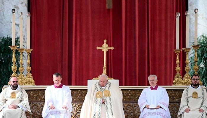 Pope Francis (C) attends the Holy Mass and canonisation of 14 saints and martyrs from Damascus, at the Saint Peters Square in the Vatican on October 20, 2024. — AFP