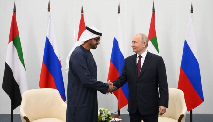 Russian President Vladimir Putin (right) with UAE President Sheikh Mohamed bin Zayed Al Nahyan (left) on the sidelines of Russias annual economic forum in St Petersburg. — AFP/file