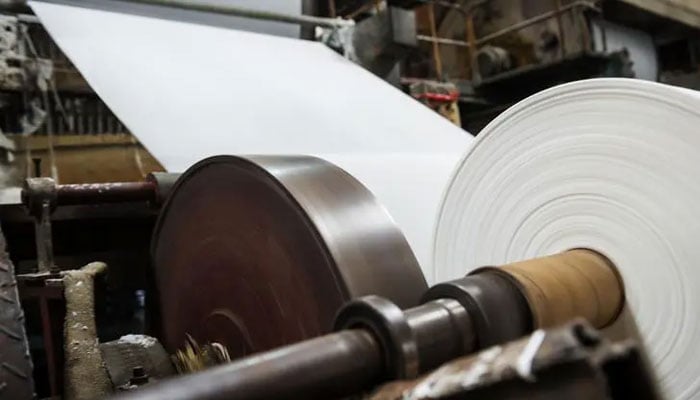 Paper being sent from a roller to a cutting machine.— security-papers website/file