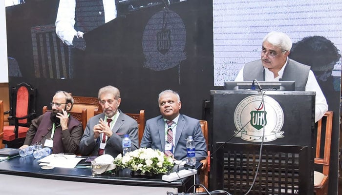 Punjab Health Minister Khawaja Salman Rafique speaks at the inaugural session of the 6th National Conference of the Pakistan Association of Medical Editors at the University of Health Sciences (UHS) on October 21, 2024. — Facebook@uhs.lhrofficial