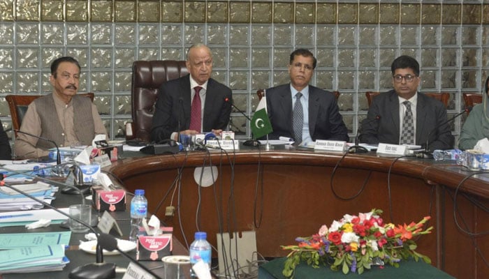 Chairman One Man Commission (OMC) Dr Shoaib Siddal presides over a meeting at the ETPB head office. — etpb.gov.pk/