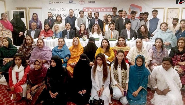 Participants pose for a group photo on the occasion of an anti-smoking seminar organized by Aurat Foundation on October 22, 2024. — INP