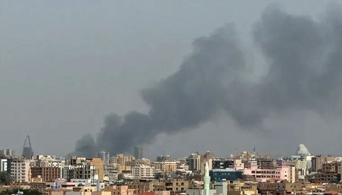 Smoke billows during air strikes in central Khartoum as the Sudanese army attacks positions held by the paramilitary Rapid Support Forces (RSF) throughout the Sudanese capital on September 26, 2024. — AFP