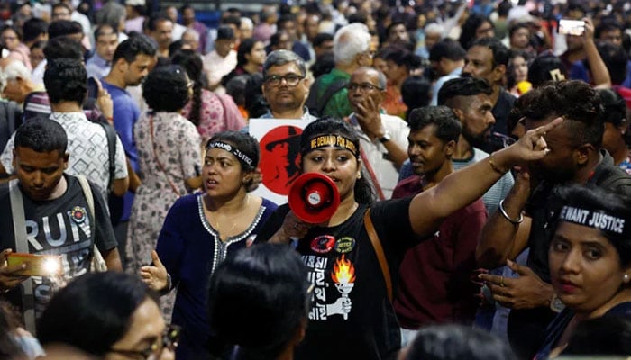 People chant slogans as they attend a protest condemning the rape and murder of a trainee medic at a government-run hospital, in Kolkata, India, October 15, 2024. — Reuters