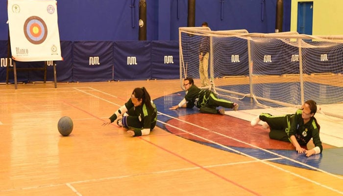 Female of Pakistan Blind Sports Federation playing goal ball on the occasion of 2 Day Blind Sports event of archery and goal ball for Pakistan Blind Sports Federation organized by NUML, Islamabad in October 22, 2024 .— Facebook.com@NUMLOFFICIALPAGE