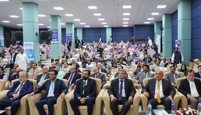 Minister for Federal Education and Professional Training Dr. Khalid Maqbool Siddique as the chief guest and other guests sitting in the opening ceremony of the 2nd IBCC Annual Conference, held on October 23,2024 at AIOU. — Facebook.com@AIOU.OfficialAccount