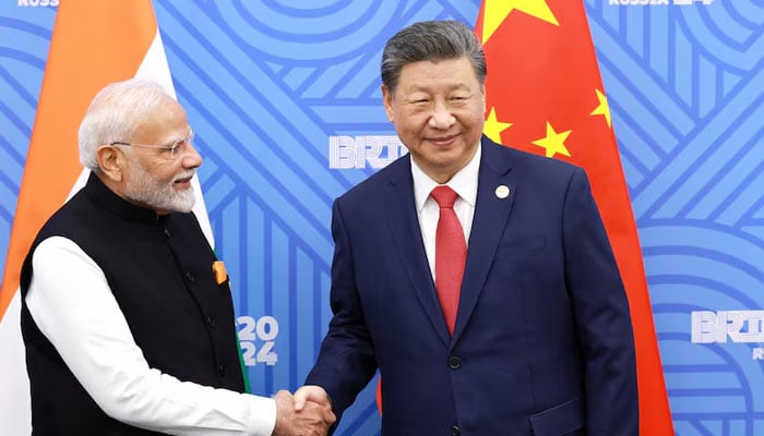 Chinese President Xi Jinping(Right) and India Prime Minister Narendra Modi(Left) meet on the sidelines of the BRICS summit in Kazan, Russia October 23, 2024.—Rueters