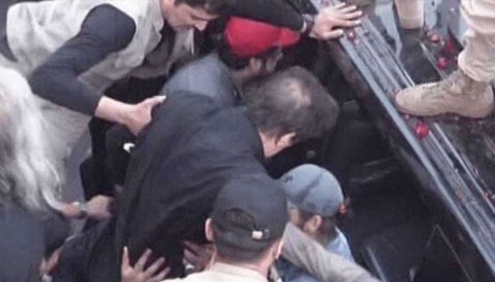 PTI chief Imran Khan being shifted to another vehicle after surviving an assassination attack in Wazirabad on November 3, 2022. — Saudi Gazette