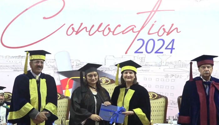 LT Gen (r) Nigar Johar, HI(M), TI(M) (from right to left) awards a degree to a graduate student at the Foundation University, Islamabad (FUI) on October 24, 2024. — Screengrab via Facebook@fuislamabad/