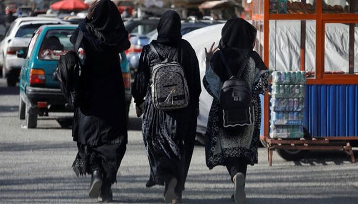 Afghan female students walk near Kabul University in Kabul, Afghanistan, December 21, 2022. — Reuters