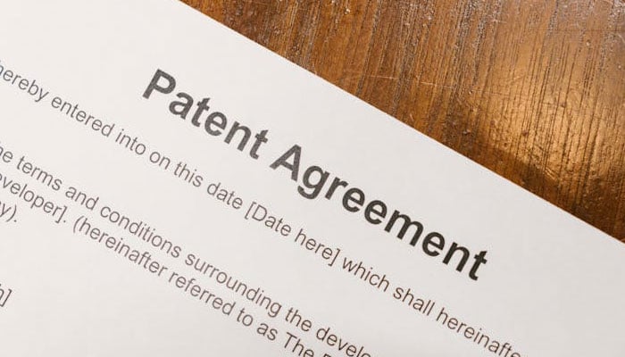 A representational image showing a patent agreement. — Pexels