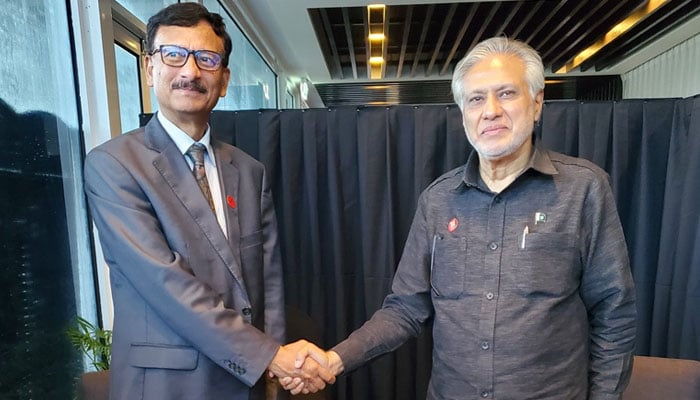 Deputy PM and FM, Senator Ishaq Dar (right) shakes hands with Adviser for Foreign Affairs of the People’s Republic of Bangladesh Md Touhid Hossain  onn the sidelines of the Commonwealth Heads of Government Meeting (CHOGM) in Samoa on October 25, 2024. — X@@ForeignOfficePk