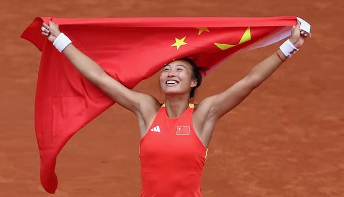 Qinwen Zheng of China celebrates after winning gold against Donna Vekic of Croatia during the Paris Olympics 2024 at Roland-Garros Stadium, Paris, France. — Reuters