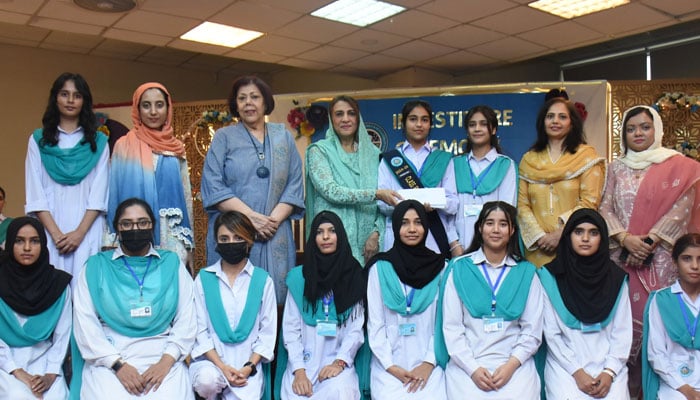 Chief guest Mrs Reema Ayyaz Sadiq (4th left) in a group photo with newly elected students council in a ceremony at FG Home Economics and Management Sciences College F11 on October 25, 2024. — Facebook@homeeconomicsrocks