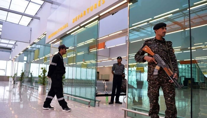 Representational image shows security officials from the Airport Security Force (ASF) standing guard at the airport in Pakistan. — AFP/File