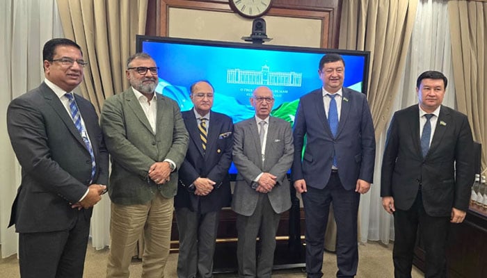 Chairman Senate Standing Committee on Foreign Affairs Irfan Siddiqui seen in a group photo leading a delegation of senators in Uzbekistan. . — APP/File