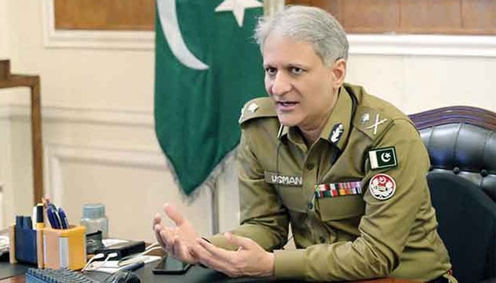 Inspector General Police (IGP) Punjab Dr Usman Anwar gestures while speaking in a meeting at his office. — APP/File