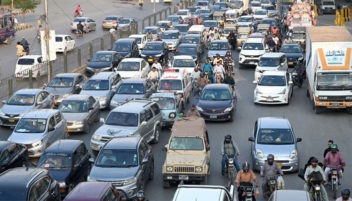 A massive traffic jam at National Stadium road in Karachi on June 29, 2024. — APP