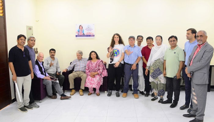 Office-bearers and activists of the 3rd World March for Peace and Non-Violence pose for a photo during their visit to the  Karachi Press Club on October 27, 2024. — Facebook@shoaibapna