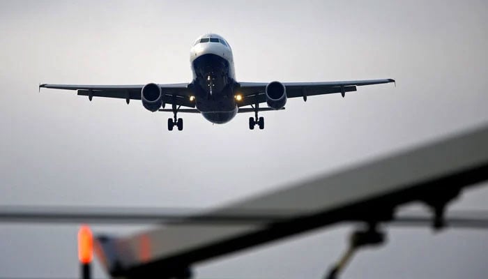 A representational image showing an aeroplane during flight. — Reuters/File