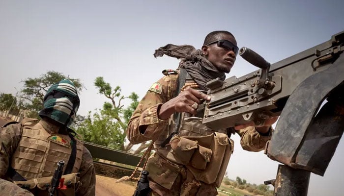 Soldiers of the Malian army are seen during a patrol on the road between Mopti and Djenne, in central Mali. —AFP/File