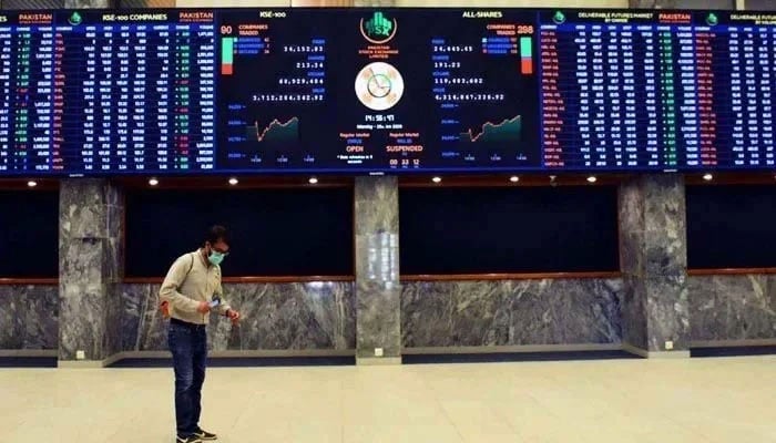 A trader can be seen at the Pakistan Stock Exchange (PSX) building in Karachi. — PPI/FIle