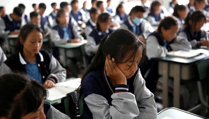 Students attend a class at the Wenchang Middle School in Yuexi county, during a government-organised media tour in Liangshan Yi Autonomous Prefecture, Sichuan province, on China September 11, 2020. —Reuters