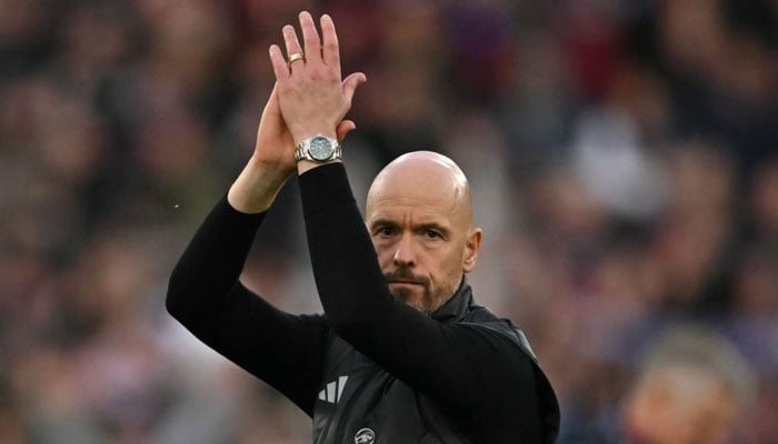 Manchester United manager Erik ten Hag clapping.— AFP/File