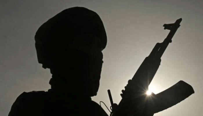 A silhouette of a terrorist with a gun.— AFP/file