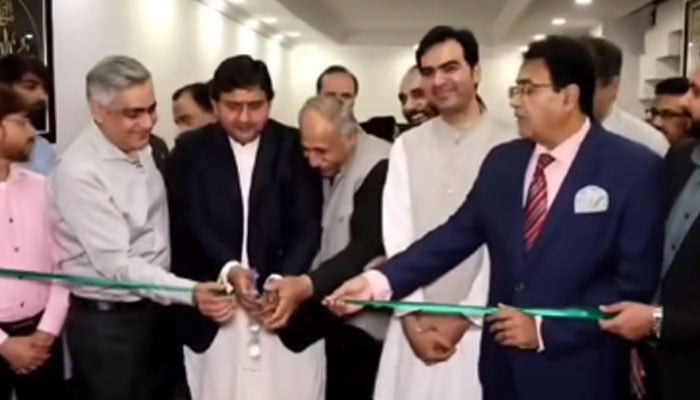 Punjab Assembly Speaker Malik Muhammad Ahmad Khan (2nd left) cuts a ribbon to inaugurate the first-ever exhibition of Islamic calligraphy artworks at the Punjab Assembly on October 28, 2024. — Screengrab via Facebook@MalikMAhmadKhan