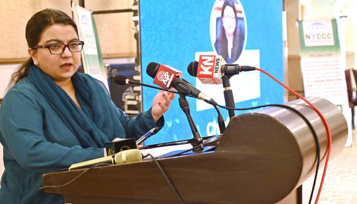 Minister of State for IT and Telecommunication, Ms Shaza Fatima Khawaja, addresses the audience as the Chief Guest at the First National Youth Climate Summit at a local hotel in Islamabad on October 28, 2024. — APP