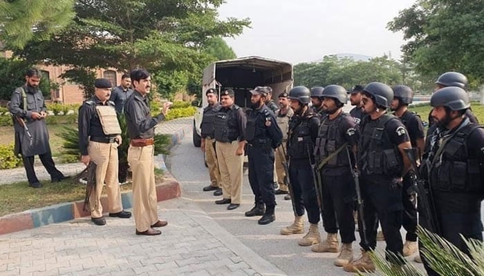 A representational image showing KP police officer interacting with the personnel in this image released on November 8, 2023. — Facebook/@pakhtunkhwapolice