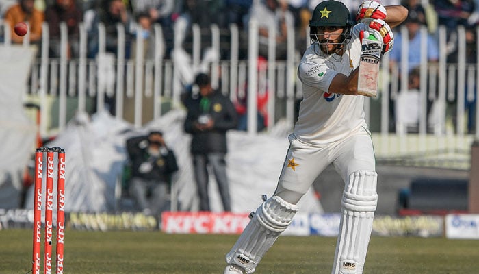 Pakistans Salman Ali Agha plays a shot during the fifth and final day of the first cricket Test match between Pakistan and England at the Rawalpindi Cricket Stadium, in Rawalpindi on December 5, 2022. — AFP