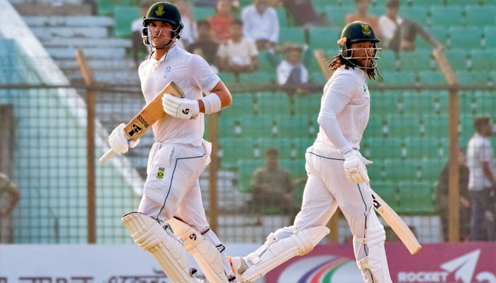 South Africa´s Tony de Zorzi (right) and Tristan Stubbs run between the wickets during the first day of the second Test cricket match between Bangladesh and South Africa at the Zahur Ahmed Chowdhury Stadium in Chittagong on October 29, 2024. — AFP