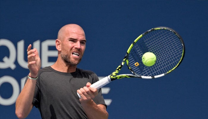 Adrian Mannarino (FRA) hits a forehand against Jannik Sinner (ITA) (not pictured) in second round play at IGA Stadium. — USA TODAY Sports/file