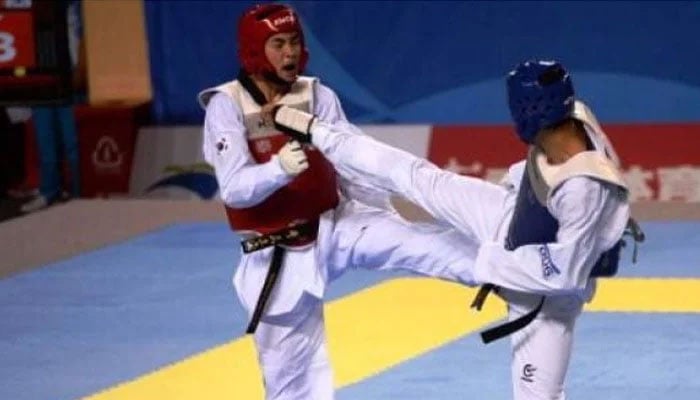 A representtional image of two taekwando fighters in action. —AFP/File