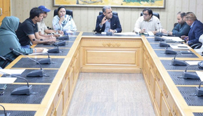 Punjab Youth Affairs DG Pervez Iqbal (centre) presides over a meeting on October 24, 2024. — Facebook@DirectorateGeneralSports&YouthAffairs,Punjab